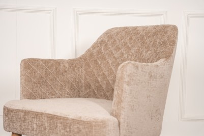 upholstered chair with arms